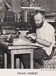 Frank Herbert at his typewriter in 1958